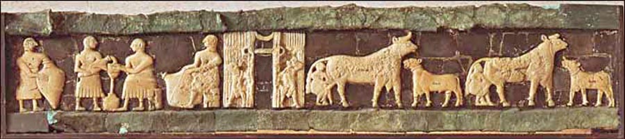 Szene mit melkenden Kühen im Fries aus dem Tempel von Tell al-Ubayd